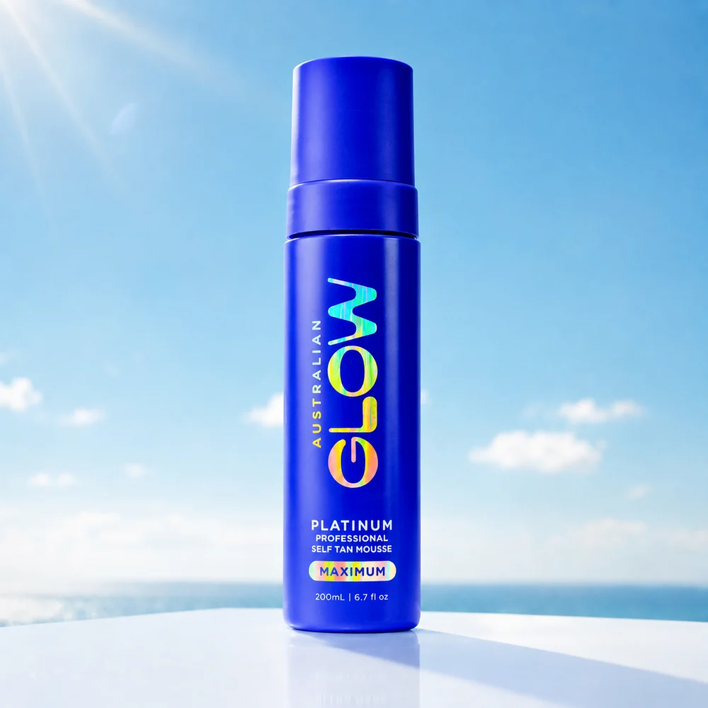 Australian Glow Platinum Professional Maximum self-tan mousse against a bright sky