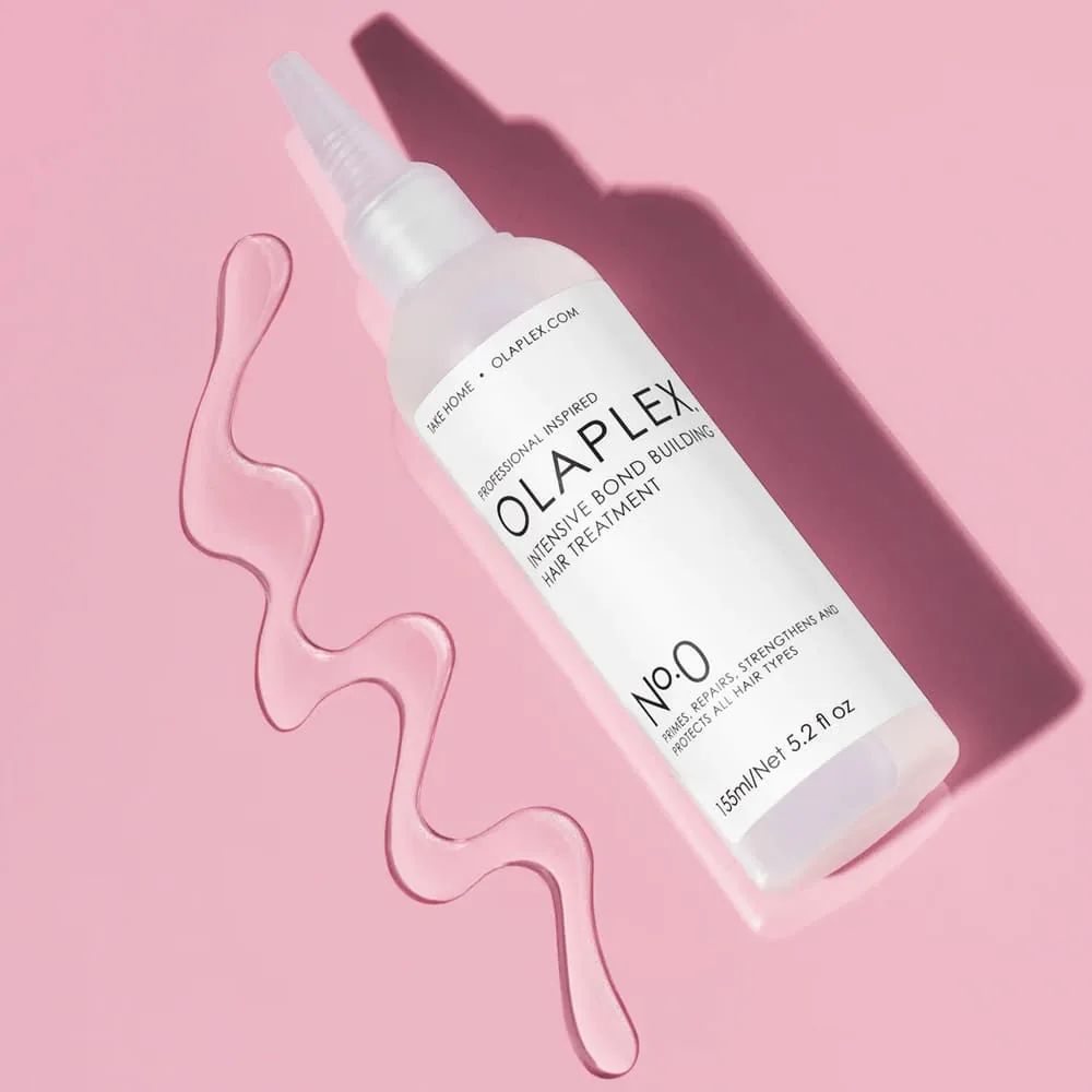 Olaplex No.0 bottle, editorial confession card