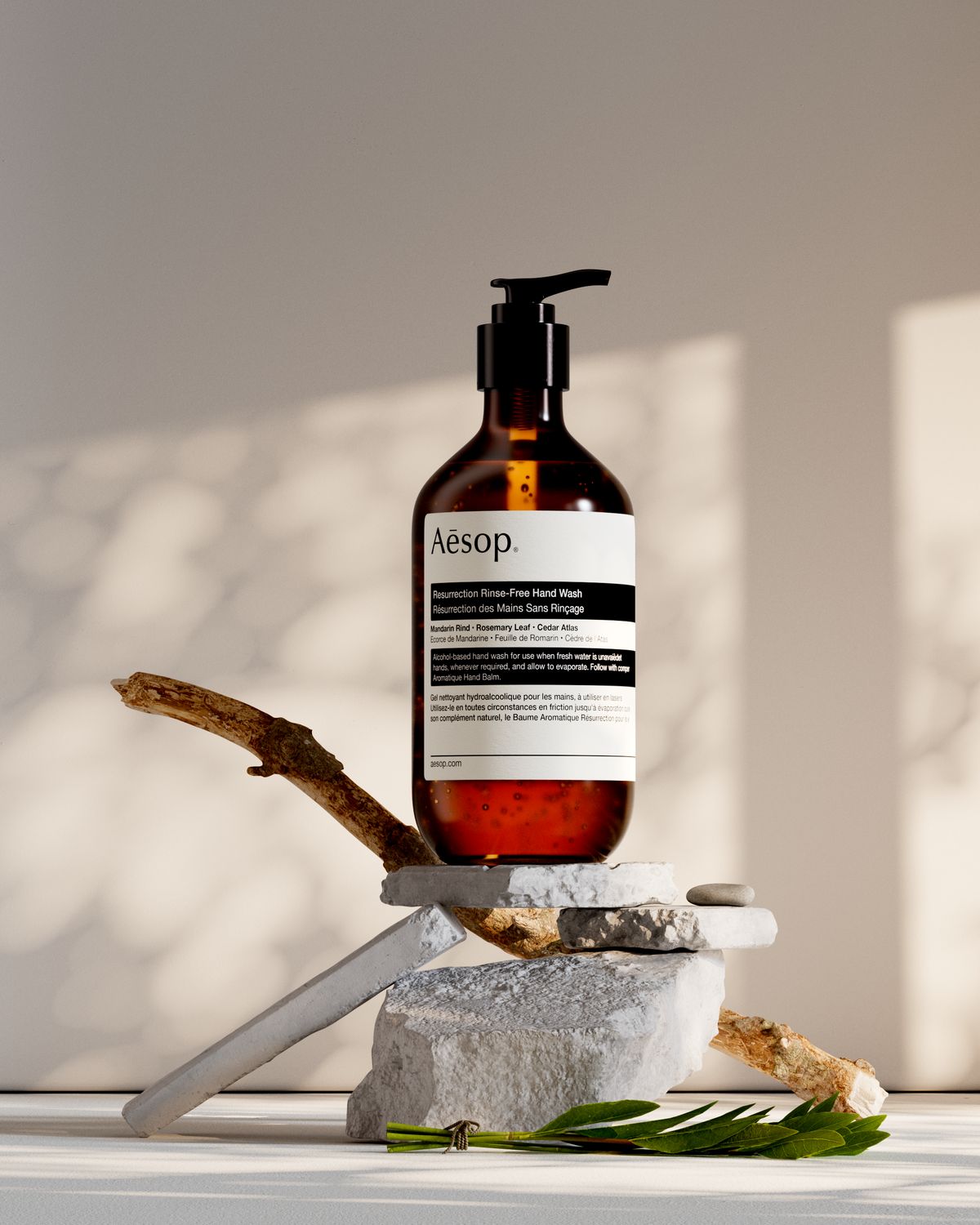 Aesop Resurrection Aromatique Hand Wash on stone and driftwood