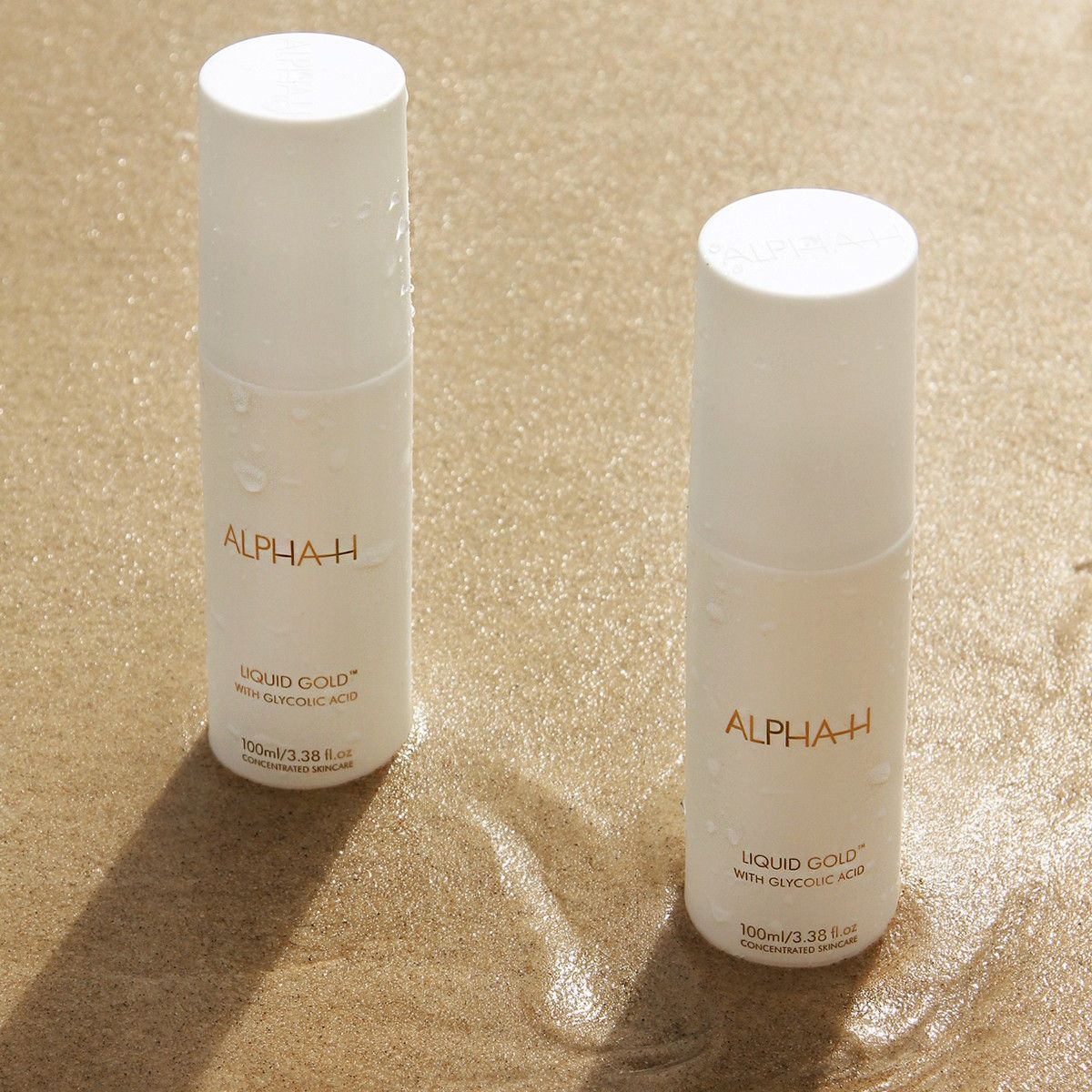 Alpha-H Liquid Gold on sand
