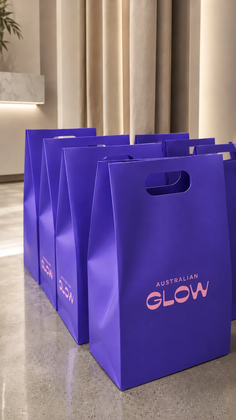 Australian Glow purple shopping bags on stone, retail world