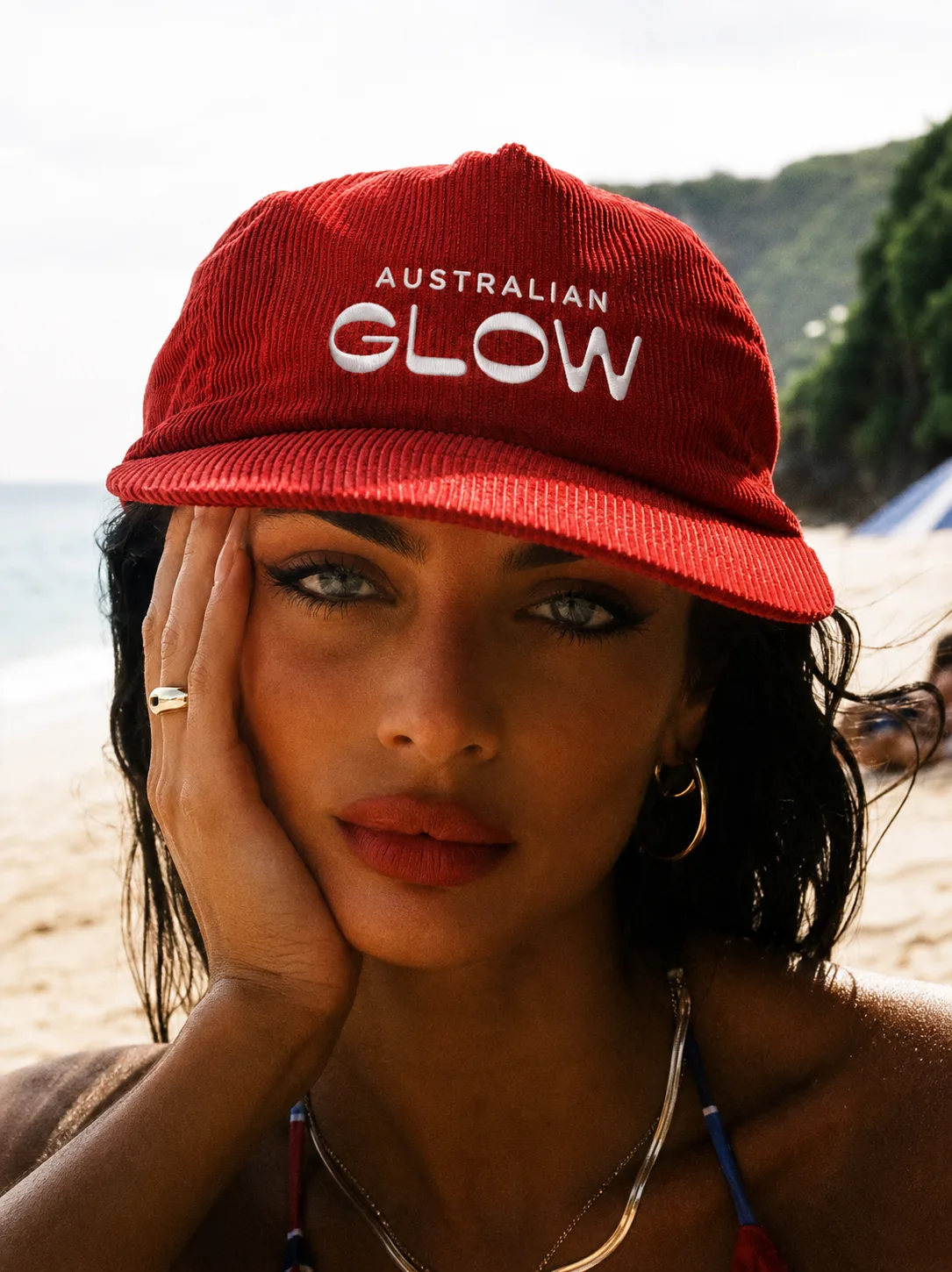 Australian Glow editorial, beach cap portrait, the chemist-shelf reset of 2026