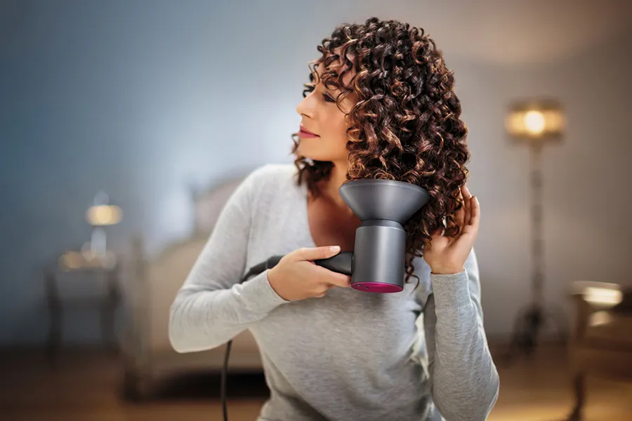 Dyson Supersonic with curly hair, styling editorial