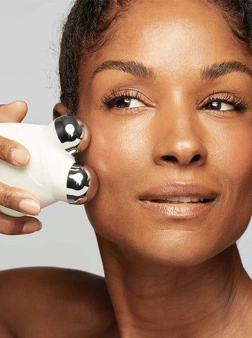NuFACE Trinity in use on dark-skin portrait, the dermatologist-recommended device