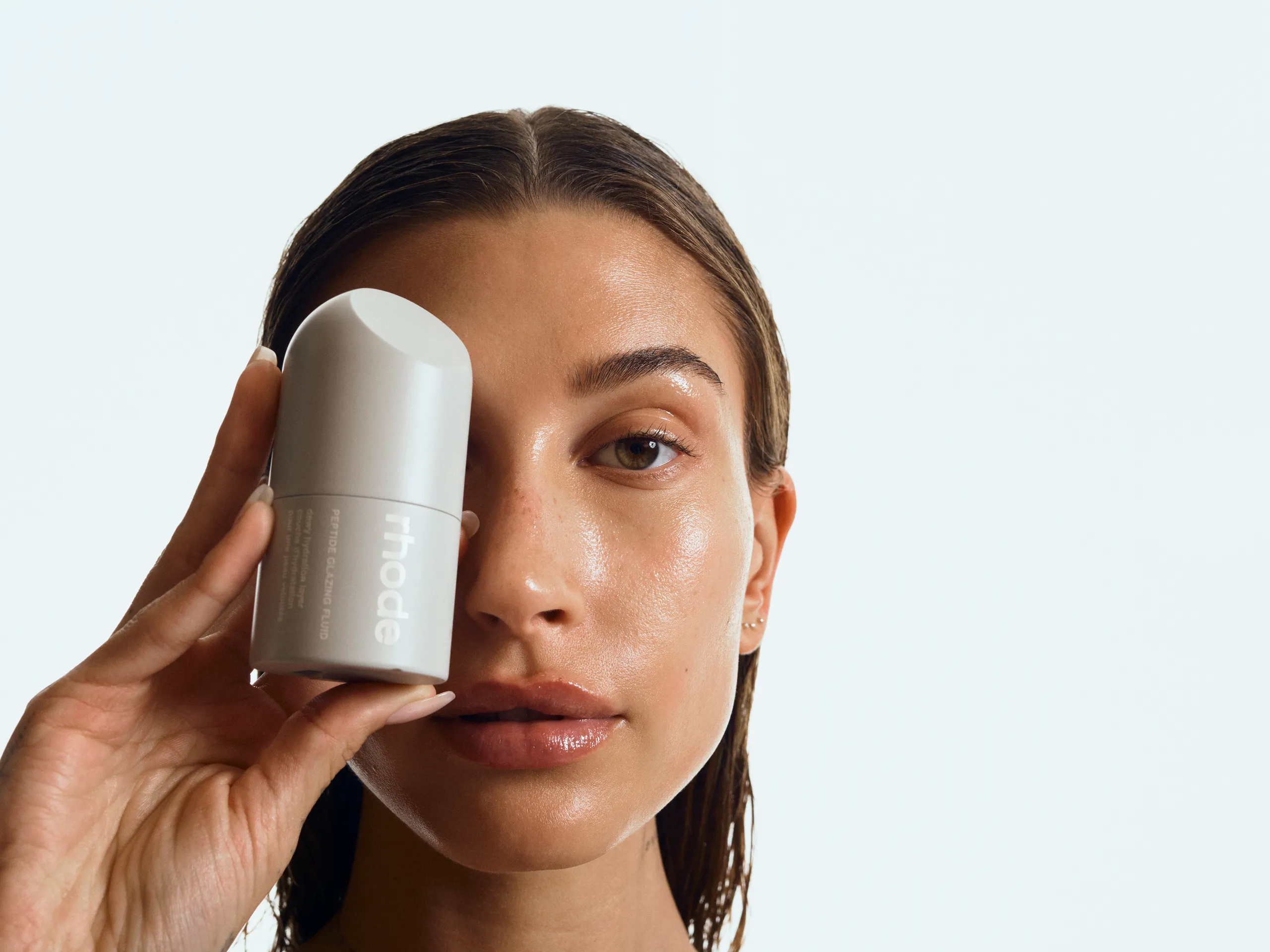 Rhode Peptide Lip Treatment and skincare, accessible premium brand editorial