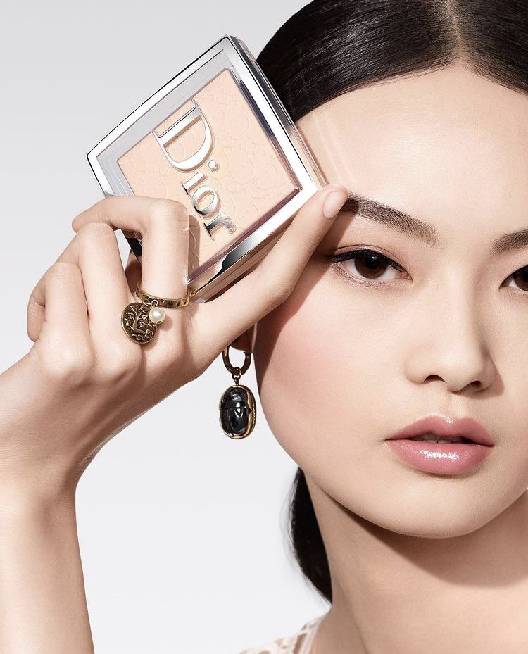 Dior Backstage compact and model, luxury beauty editorial