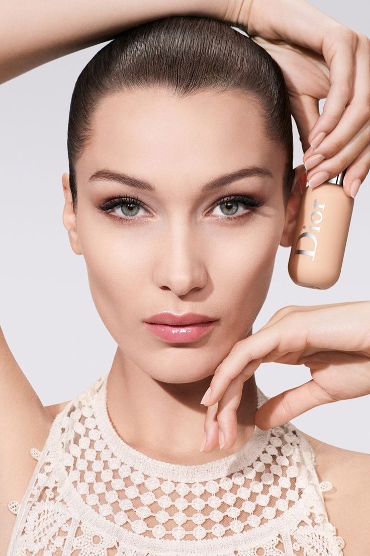 Bella Hadid Dior campaign portrait with Backstage foundation bottle