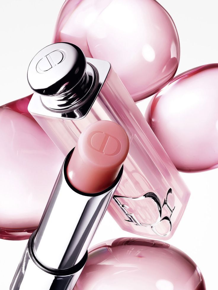Dior Addict Lip Glow Oil with pink glass spheres, pink-toned sheer lip oil