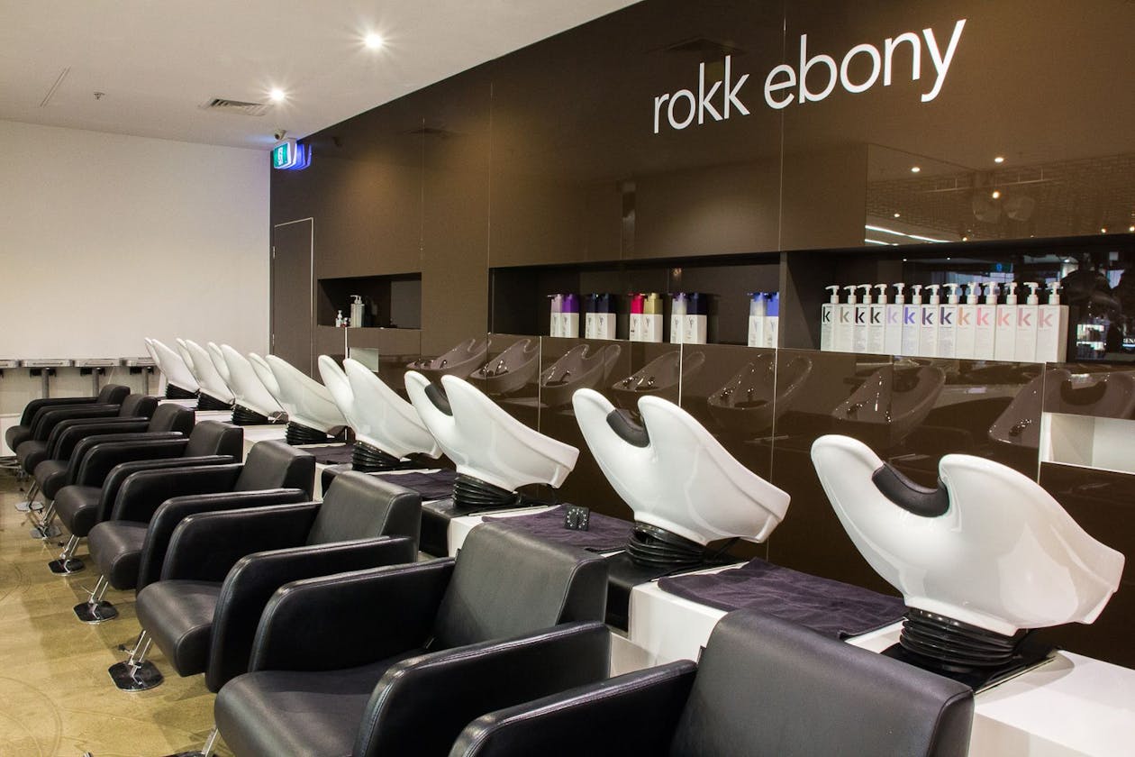 Rokk Ebony Chapel Street, flagship wash station with KEVIN.MURPHY product wall