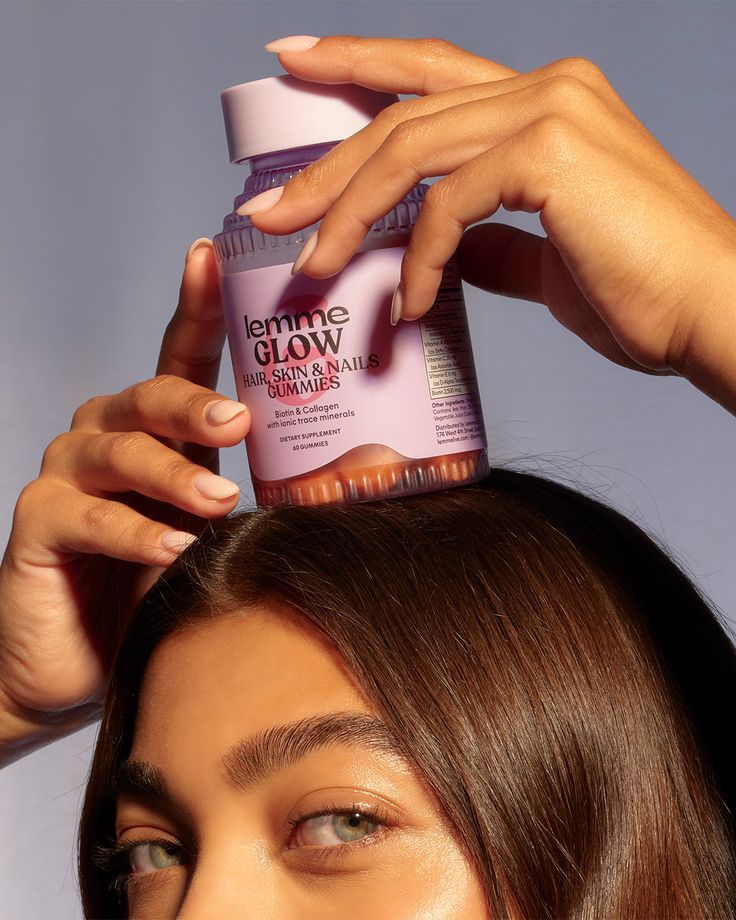 Supplements about frame, bottle pour into open palm