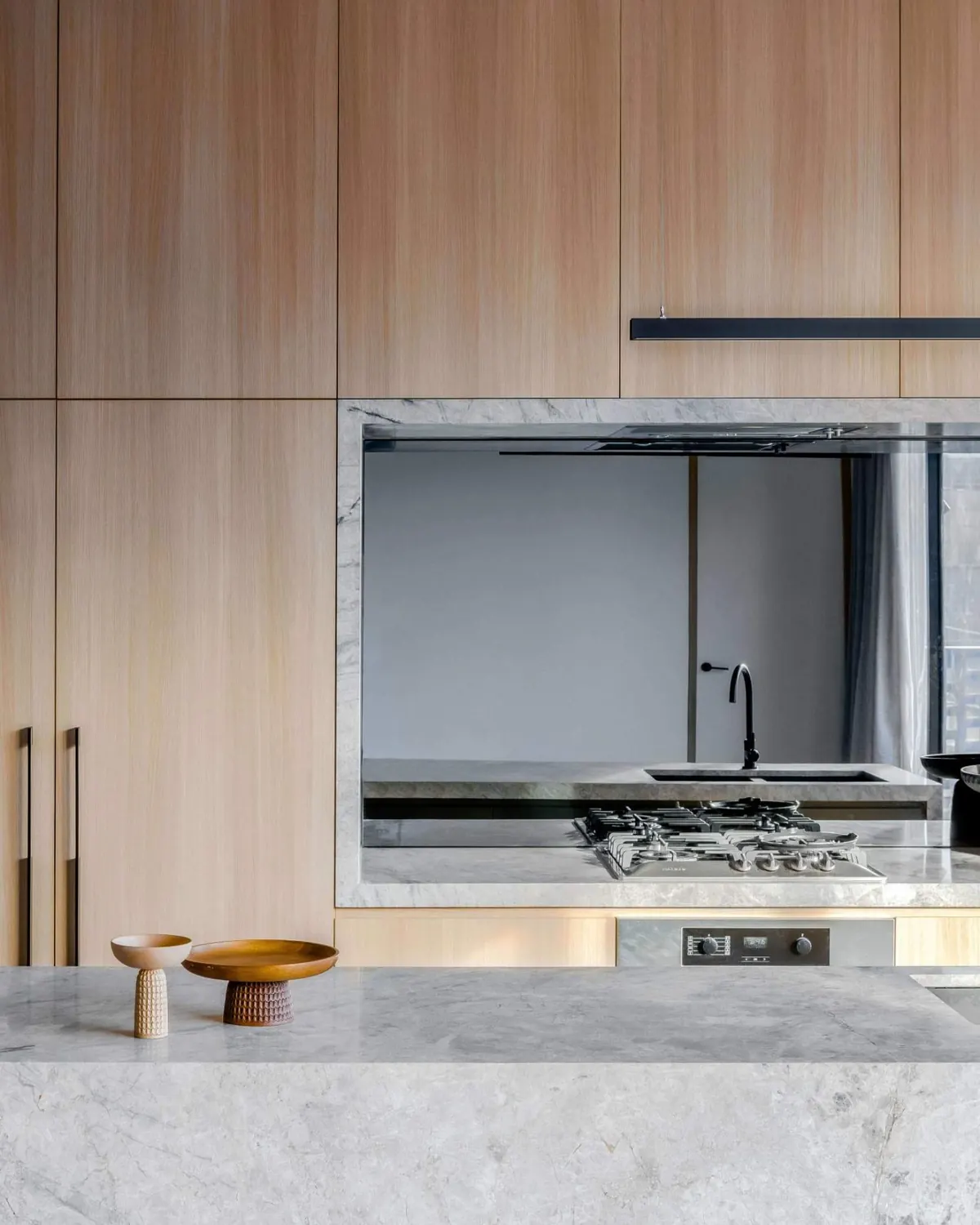 Marble island and oak joinery