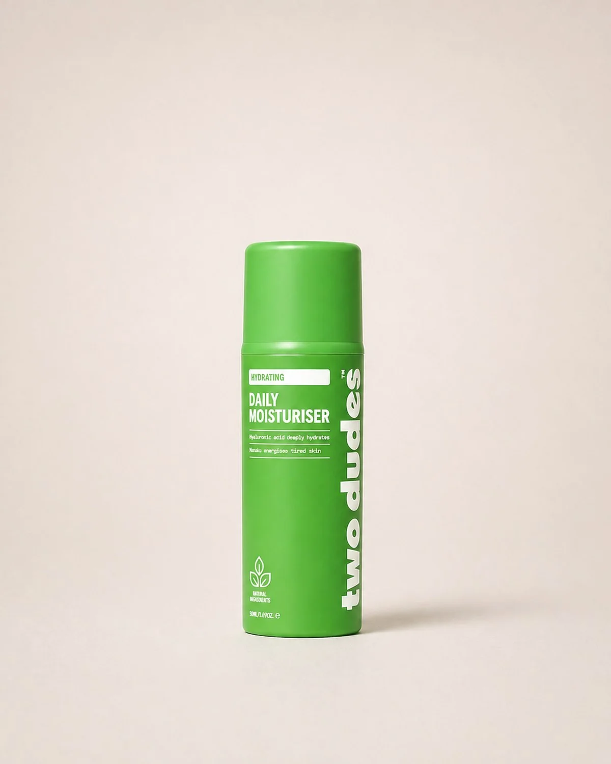 Two Dudes Day Cream tube, green on cream